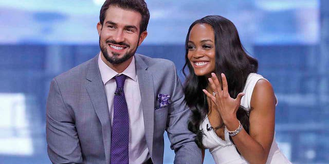 "The Bachelorette" star Rachel Lindsay and fiance Bryan Abasolo pose on "Good Morning America" in August 2017. They tied the knot in late August 2019.
