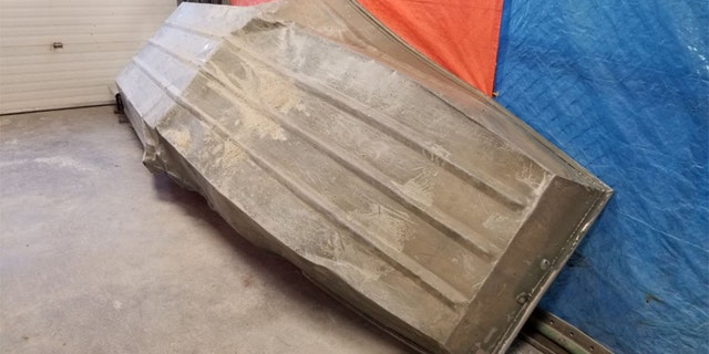 The damaged aluminum boat discovered on the shore of the Nelson River in northern Manitoba provides a new lead in the manhunt for the two murder suspects.