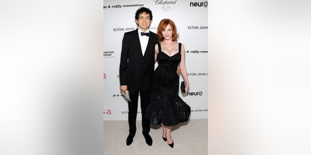 Geoffrey Arend and Christina Hendricks attend the 18th Annual Elton John AIDS Foundation Academy Award Party at Pacific Design Center on March 7, 2010 in West Hollywood, California. (Photo by Larry Busacca/Getty Images)