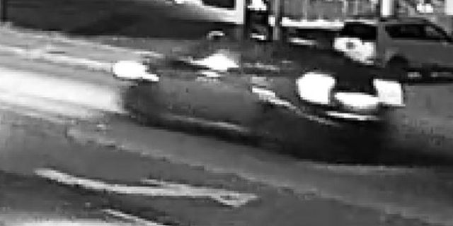 A man suspected of shooting a churchgoer on Sunday drove off in a car, police said.