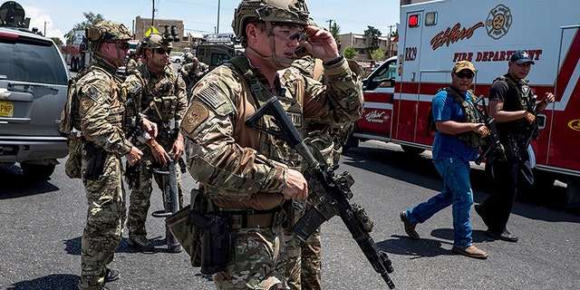Law enforcement agencies respond to the shooting at a Walmart near Cielo Vista Mall in El Paso, Texas, on Aug. 3.