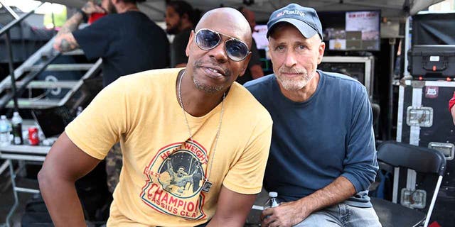 Dave Chappelle and Jon Stewart pose backstage during Dave Chappelle's Block Party on Aug. 25, 2019 in Dayton, Ohio.