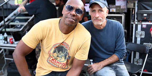 Dave Chappelle and Jon Stewart pose backstage during Dave Chappelle's Block Party on Aug. 25, 2019 in Dayton, Ohio.