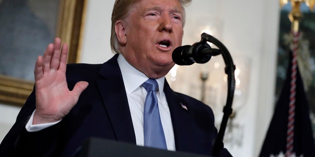 FILE - In this Monday, Aug. 5, 2019, file photo, President Donald Trump speaks about the mass shootings in El Paso, Texas and Dayton, Ohio, in the Diplomatic Reception Room of the White House, in Washington. Scientific studies have found no link between video games and violent behavior. An online manifesto thought to be authored by the gunman in El Paso briefly mentioned the combat game Call of Duty. Then Trump weighed in, charging Monday that gruesome and grisly video games contribute to a glorification of violence. (AP Photo/Evan Vucci, File)