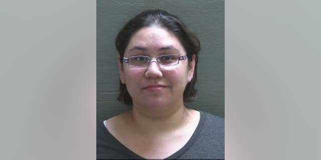 Amanda Kondrat'yev, 35, has pleaded guilty to throwing a drink at a Florida congressman, authorities say. (Escambia County jail)