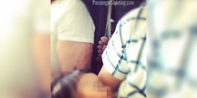 The viral photo shows an unnamed passenger rudely sticking their bare foot somewhere it doesn't belong.