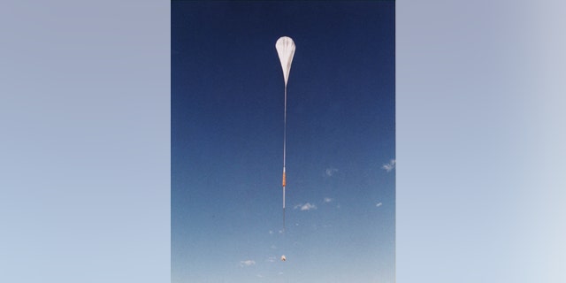 A NASA high altitude helium balloon equiped with observation tools is seen above. (Getty Images)