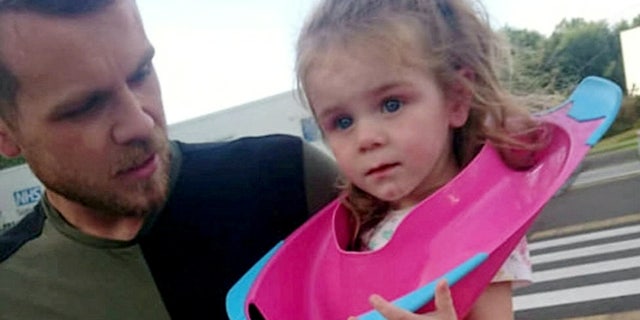 Two-year-old Josie was rushed to the emergency room to remove the toilet seat from her head. (SWNS)
