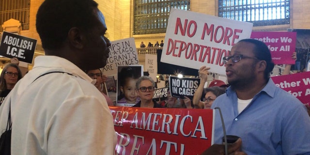 Demonstrators from both sides of the nation's debate on the U.S.-Mexico border crisis face off Thursday at Grand Central Terminal in New York City. (Danielle Wallace/Fox News)