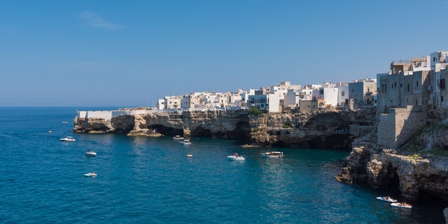 The famous sea town in province of Bari, southern Italy. The village rises on rocky spur over the Adriatic Sea, and is known tourist attraction.