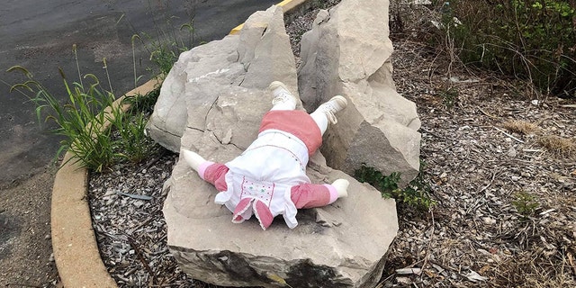 A doll is seen with its head cut off in Jefferson County, Missouri.