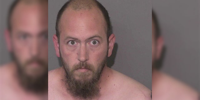 Mugshot for Joshua Burgess, 32, charged with killing 15-year-old daughter in North Carolina Sunday.