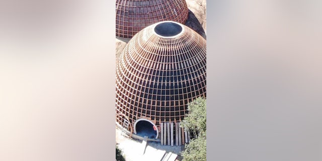 West now has until September 15 to secure the proper building permits, or the 50-foot-high huts must be torn down. (Backgrid)