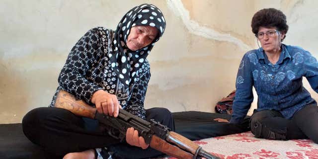 Women of all ages in the Kongra Star learn basic firearms use