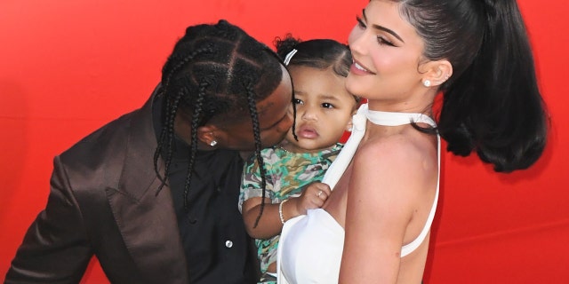 Kylie Jenner — seen here with Stormi and Stori's dad Travis Scott, whom Jenner recently split with — is now selling sweathirts inspired by her viral 