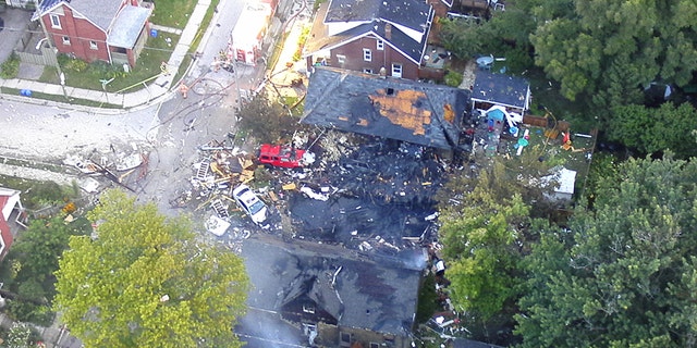 Photo shows devastation after a crash, explosion and fire Wednesday night in London, Ontario.