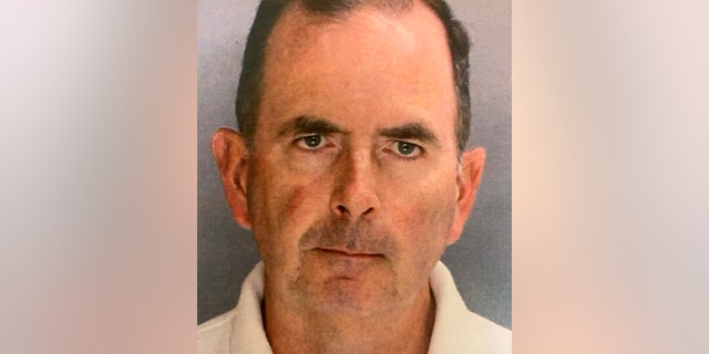The Chester County District Attorney's Office said McLoone was arrested Wednesday for theft from St. Joseph's Catholic Church in Downingtown, Pa. (Chester County District Attorney's Office via AP)