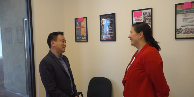 Duy Nguyen, executive director of One APIA Nevada (left) talks with Democratic Assemblywoman Rochelle Nguyen (right).