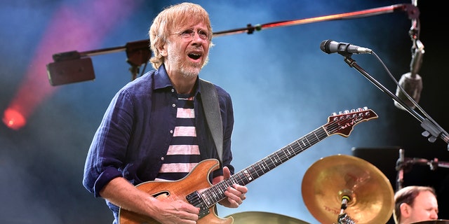 Phish's Trey Anastasio performs at the 2019 edition of Bonnaroo Music & amp; Festival of the arts June 16, 2019 in Manchester, Tennessee. Camping outside a series of Phish concerts in Denver was banned due to the presence of plague-struck prairie dogs in the area.
