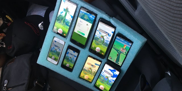 Washington State Patrol Sgt. Kyle Smith discovered a driver along the side of a highway playing "Pokemon Go" on eight phones on Tuesday, acording to police.