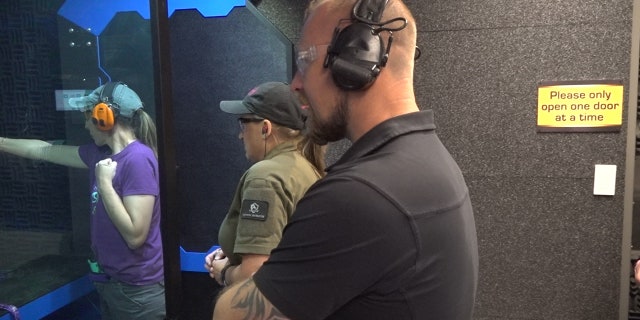 Stephen Powell, administrator and training director of C2 Tactical, working with members from the Well Armed Woman.