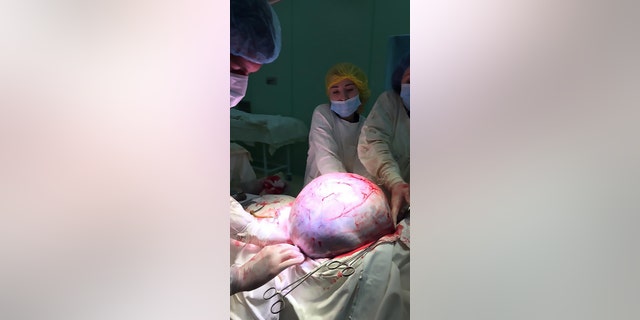 The tumor had been causing the patient severe pain and breathing issues.