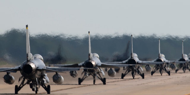 U.S. Air Force F-16 Vipers assigned to the 20th Fighter Wing taxi on the runway at Shaw Air Force Base, South Carolina. The base is planning two days off to promote mental health in August and September.