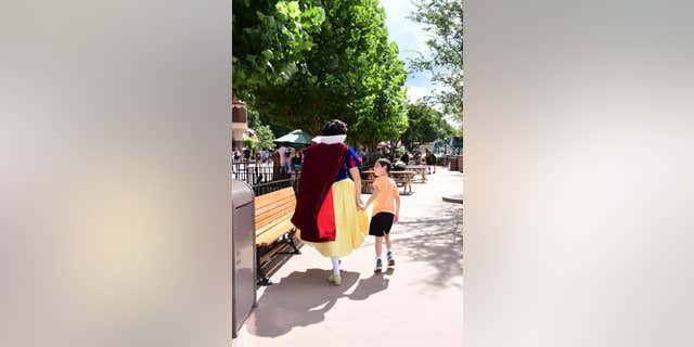 Bergner shared that Snow White danced and held the boy's hand after he became overwhelmed in line.