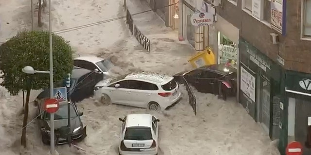 Madrid area inundated by severe rain, hail storm that spawned dramatic ...