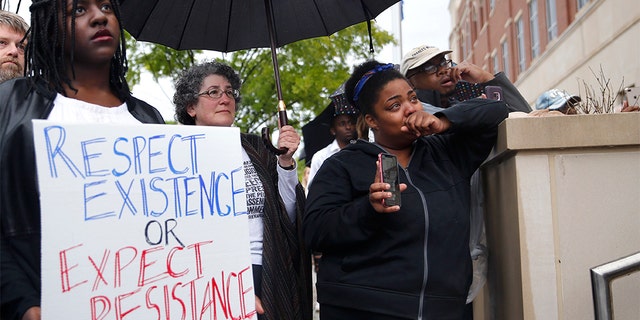 In this May 3 photo, people listen to speakers at the Edmond Police Department during a Black Lives Matter rally. (Sarah Phipps/The Oklahoman via AP File)