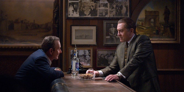 This image released by Netflix shows Joe Pesci, left, and Robert De Niro in a scene from "The Irishman." Netflix said Tuesday, Aug. 27, 2019 that “The Irishman” will open theatrically Nov. 1 and begin streaming on Nov. 27.