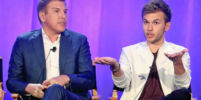 Producer/TV personality Todd Chrisley and son Chase Chrisley speak onstage during the "Chrisley Knows Best" panel at the 2016 NBCUniversal Summer Press Day April 1, 2016. 