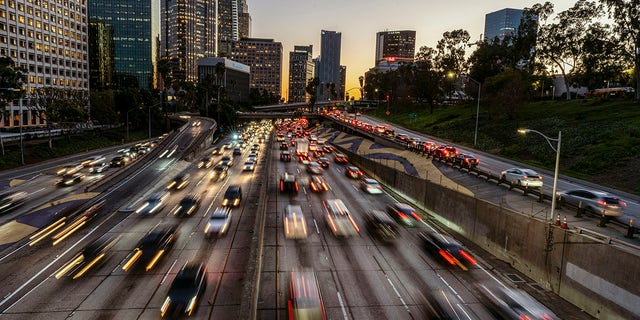 FILE –Los Angeles, Calif.: A view of downtown Los Angeles skyline and traffic on the 110 Free-way. (Photo by Ronen Tivony/SOPA Images/LightRocket via Getty Images)