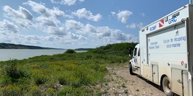 Manitoba RCMP's Underwater Recovery Team arrived Gillam, Manitoba Saturday night and divers will begin to search a section of the Nelson River on Sunday, according to authorities.