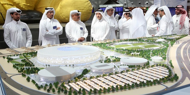 Akbar al-Baker, Qatar Airways Chief Executive, looks at a model of Al Thumama stadium during an unveiling ceremony at Hamad International Airport in Doha, Qatar, August 24, 2017.