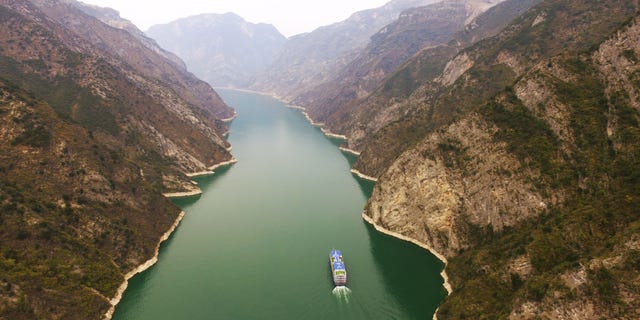 A ship sails in the Wuxia Gorge, one of the Three Gorges on the Yangtze River, in Wushan County, southwest China, back in March. (Xinhua/ via Getty Images)