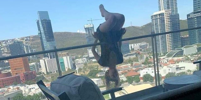 In August, college student Alex Terrazas was photographed hanging upside down over a balcony railing with her knees bent practicing a yoga pose before falling 80 feet.