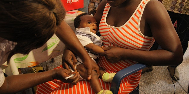 Child receiving Yellow fever vaccine delivered by Zipline drone at New Tafu Hospital, Ghana