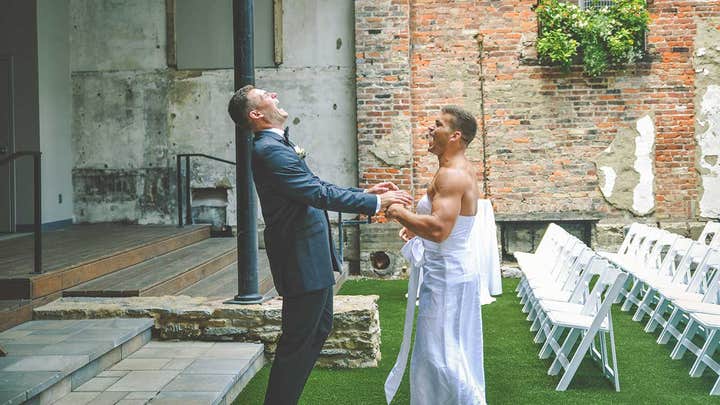 Mystery woman riding scooter photo-bombs wedding party
