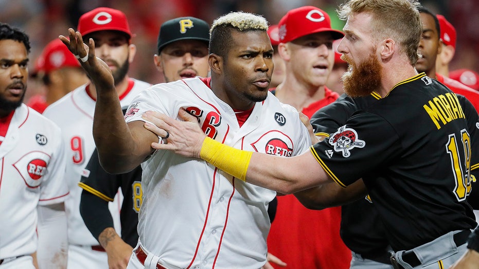 Offense breaks out after brawl as Pirates finish sweep of Reds