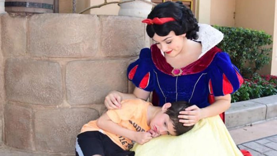 Image result for Snow White comforts boy with autism who had "meltdown" in Disney World