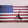 Simone Biles competes on the beam during the senior women's competition at the 2019 U.S. Gymnastics Championships in Kansas City, Aug. 11, 2019. 