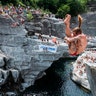 Matthias Appenzeller in action during the international cliff diving championships, in the Maggia valley in Ponte Brolla, Switzerland, July 27, 2019. 
