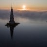 The famous Kalyazin Bell Tower, part of the submerged monastery of St. Nicholas, is seen in the morning fog in the town of Kalyazin north-east of Moscow, Russia, August 12, 2019. 