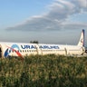 A Ural Airlines Airbus 321 passenger plane sits in a cornfield following an emergency landing near Zhukovsky International Airport in Moscow Region, Russia, Aug. 15, 2019. 