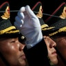 A member of an honor guard grimaces as he and his comrades prepare for a welcome ceremony for visiting Colombia's President Ivan Duque, at the Great Hall of the People in Beijing, July 31, 2019.