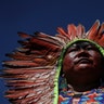A female indigenous chief attends a march by indigenous women protesting the policies of Brazilian President Jair Bolsonaro in Brasilia, Brazil, Aug. 13, 2019.