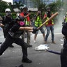 Police and demonstrators clash during a protest in Hong Kong, Aug. 24, 2019. 