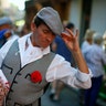 A couple dances during the Nuestra Senora de la Paloma festivities in Madrid, Spain, Aug. 14, 2019. 