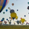 More than 400 hot air balloons depart from the Chambley-Bussieres airbase during an attempt to break the simultaneous air balloon take off world record in Hagéville, France, July 29, 2019.